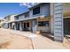Two-story townhomes featuring well-maintained exteriors, pillars and easy sidewalk access at 7801 N 44Th Dr # 1003, Glendale, AZ 85301