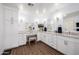 Well-lit bathroom with dual sinks, granite countertops, and ample cabinet space, creating a luxurious and functional space at 7802 N 6Th St, Phoenix, AZ 85020
