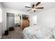 Bright bedroom with mirrored closet and comfortable furnishings at 7802 N 6Th St, Phoenix, AZ 85020