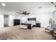 Oversized primary bedroom boasts a ceiling fan and plenty of space at 7802 N 6Th St, Phoenix, AZ 85020