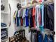 Organized closet with hanging racks and shelving for efficient storage at 7802 N 6Th St, Phoenix, AZ 85020