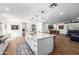 Spacious kitchen with center island, stainless steel appliances, and open layout at 7802 N 6Th St, Phoenix, AZ 85020