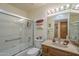Bathroom with shower, tub, vanity, and great natural light at 8160 E Keats Ave # 364, Mesa, AZ 85209