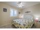 Comfortable bedroom with natural light, ceiling fan, and shutters at 8160 E Keats Ave # 364, Mesa, AZ 85209