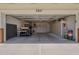 Spacious two-car garage featuring ample built-in storage and room for a golf cart, ideal for organization at 8160 E Keats Ave # 364, Mesa, AZ 85209