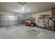 Spacious garage with car, tool storage and automatic door at 8160 E Keats Ave # 364, Mesa, AZ 85209