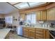 Updated kitchen with stainless appliances, backsplash, and light countertops at 8160 E Keats Ave # 364, Mesa, AZ 85209