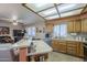Bright kitchen with stainless steel appliances, light countertops, and wood cabinetry at 8160 E Keats Ave # 364, Mesa, AZ 85209