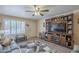 Comfortable living room featuring a large entertainment center, plush seating, and modern decor at 8160 E Keats Ave # 364, Mesa, AZ 85209