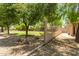Large trees offer plenty of shade in the property's backyard, which is perfect for playing and relaxing at 8321 W Hughes Dr, Tolleson, AZ 85353