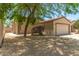 This home has a quaint entrance, a two car garage, and desert landscaping for easy maintenance at 8321 W Hughes Dr, Tolleson, AZ 85353