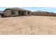 Backyard featuring a covered patio, ample space and block fencing at 8350 W Carole Ln, Glendale, AZ 85305
