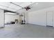 Clean two car garage with epoxy floor at 8350 W Carole Ln, Glendale, AZ 85305