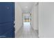 Inviting entryway with tile flooring leads into bright home with backyard access at 8350 W Carole Ln, Glendale, AZ 85305
