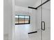 Bright living area featuring a sliding glass door leading to the backyard at 8350 W Carole Ln, Glendale, AZ 85305