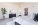 Comfortable main bedroom with light flooring, modern furniture, and bright natural light at 8366 E Old Paint Trl # 3, Scottsdale, AZ 85266