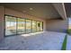 Covered patio with sliding glass doors, tile flooring, and ample space for outdoor seating and dining at 8366 E Old Paint Trl # 3, Scottsdale, AZ 85266