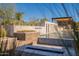 Inviting pool area with a tanning ledge, water feature, and outdoor kitchen at 8366 E Old Paint Trl # 3, Scottsdale, AZ 85266