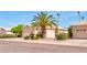 Well-maintained home featuring mature landscaping and a private driveway at 9248 E Blanche Dr, Scottsdale, AZ 85260