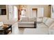 Living room with modern decor, large sectional, and luxury vinyl flooring at 9248 E Blanche Dr, Scottsdale, AZ 85260