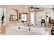 Bright living room with a comfortable sofa and view of the outdoor pool area at 9248 E Blanche Dr, Scottsdale, AZ 85260