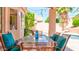 Inviting covered patio with dining area overlooking the pool at 9248 E Blanche Dr, Scottsdale, AZ 85260