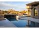 Stunning pool and outdoor area featuring a modern design with desert landscape views at 9750 E Troon North Dr, Scottsdale, AZ 85262