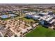 Aerial view of community amenities including pool, splash pad, tennis court, and park at 10127 E Tillman Ave, Mesa, AZ 85212