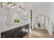 Modern bathroom features dual sinks, quartz countertops, and a walk-in closet at 10127 E Tillman Ave, Mesa, AZ 85212