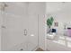 Bright bathroom with glass enclosed shower and modern fixtures at 10127 E Tillman Ave, Mesa, AZ 85212