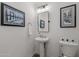 Powder room features stylish fixtures and decor at 10127 E Tillman Ave, Mesa, AZ 85212