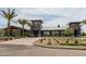 Modern community clubhouse with ample parking, lush landscaping, and an inviting entrance at 10127 E Tillman Ave, Mesa, AZ 85212