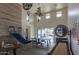 Fun game room with a shuffleboard, ping pong, basketball hoop, and various playful decorations at 10127 E Tillman Ave, Mesa, AZ 85212