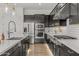 Well-equipped kitchen featuring modern appliances, ample cabinetry, and stylish backsplash and countertops at 10127 E Tillman Ave, Mesa, AZ 85212