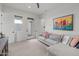 Bright living room with comfortable seating and a view to the outdoors at 10127 E Tillman Ave, Mesa, AZ 85212