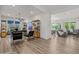 Spacious, open-concept layout showcasing versatile living and dining areas with stylish decor and natural light at 10127 E Tillman Ave, Mesa, AZ 85212