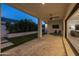 Relaxing outdoor patio with chaise lounges, ceiling fan, and a seamless transition to the indoor living space at 10127 E Tillman Ave, Mesa, AZ 85212
