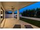Elegant outdoor patio with a ceiling fan, lighting, and easy access to the indoor living areas at 10127 E Tillman Ave, Mesa, AZ 85212