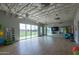 Yoga studio with wood floors, storage, and expansive mirror, perfect for group fitness and wellness activities at 10127 E Tillman Ave, Mesa, AZ 85212