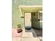 Inviting front door with security screen, adorned with a decorative flower pot at 10215 N 8Th St # B, Phoenix, AZ 85020