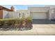 Contemporary home with a two-car garage, stucco exterior, and desert landscaping at 11079 N 110Th Pl, Scottsdale, AZ 85259