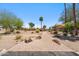 Inviting front yard with desert landscaping and a brick pathway leading to the residence at 11079 N 110Th Pl, Scottsdale, AZ 85259
