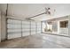 Spacious two-car garage features new garage door with opener and ample space at 11079 N 110Th Pl, Scottsdale, AZ 85259
