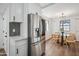 Kitchen with stainless steel fridge and dining table at 11079 N 110Th Pl, Scottsdale, AZ 85259