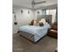 Comfortable bedroom with a plush bed, soft carpet, and lots of natural light at 11250 N 33Rd Ave, Phoenix, AZ 85029