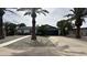 Charming single-story home with desert landscaping, mature palm trees, and a two-car garage at 11250 N 33Rd Ave, Phoenix, AZ 85029