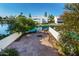 Waterfront backyard with stone flooring, fire pit, and stunning community views at 1134 E Driftwood Dr, Tempe, AZ 85283