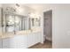 Bright bathroom features a double sink vanity with a walk-in shower at 1134 E Driftwood Dr, Tempe, AZ 85283