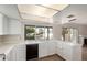 Bright kitchen featuring all-white cabinetry, countertops, and modern appliances at 1134 E Driftwood Dr, Tempe, AZ 85283