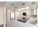Bright kitchen featuring all-white cabinetry, countertops, and modern appliances at 1134 E Driftwood Dr, Tempe, AZ 85283